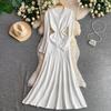 High-end celebrity elegant and sexy single-breasted crew neck dress women's new texture knitted hollow fishtail dress