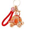 Elegant Pumpkin Car Charm Keychain Accessory For Women With Metallic Finish And Colorful Ropes Ideal For Gifts And Special Occasions