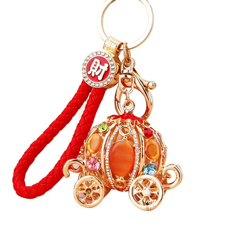 Elegant Pumpkin Car Charm Keychain Accessory For Women With Metallic Finish And Colorful Ropes Ideal For Gifts And Special Occasions