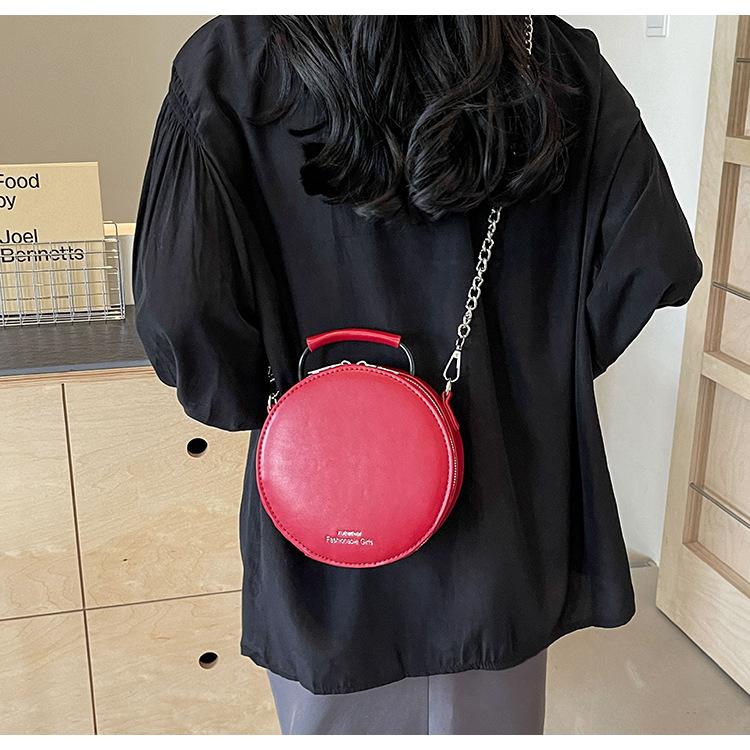 Damen-Sommertasche, großes Blumen- und kleines rundes Design.