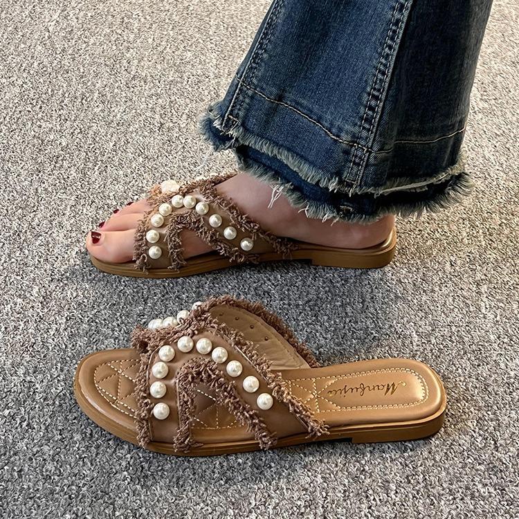 Sommer neue Xiaoxiangfeng flachbodige Hausschuhe Damen tragen Frühling sanfte Fee vielseitige Perle Strandsandalen