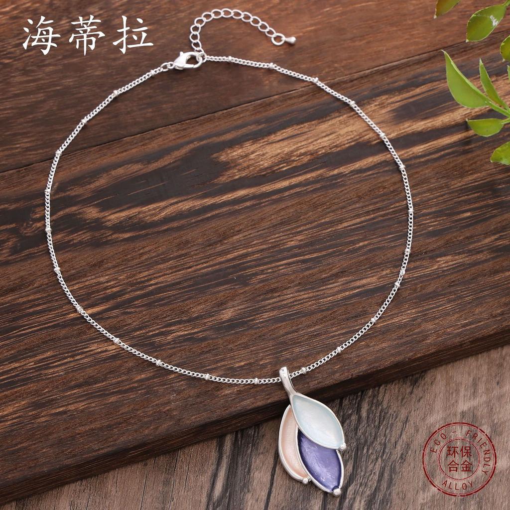 New color-coated geometric petal pendant, simple, small and fresh women's versatile leaf pendant