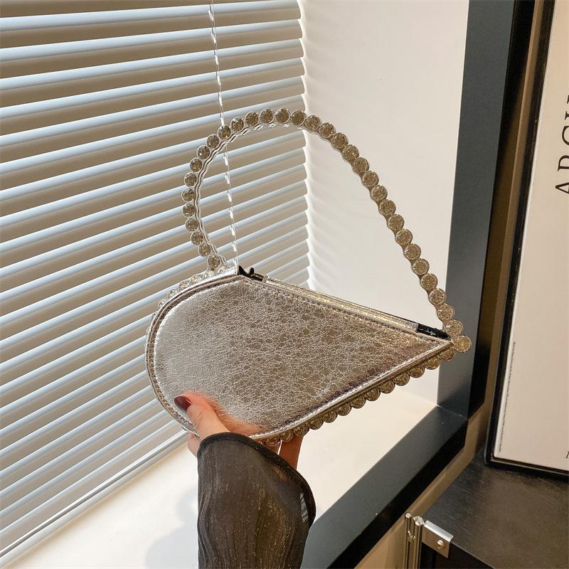

Trend niche design heart-shaped light luxury high-end texture temperament handbag handbag female серебряный