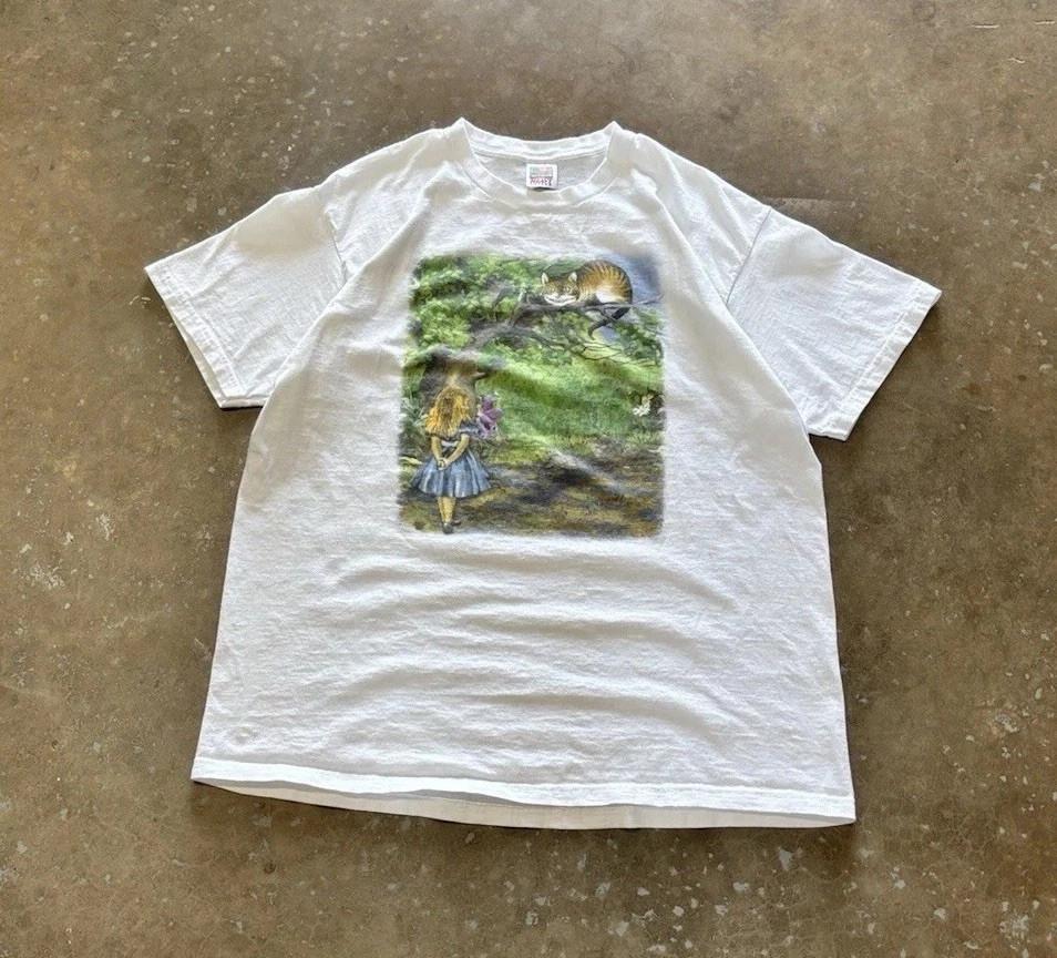 

Vintage 90’s Rare Alice In Wonderland Cheshire Movie Promo T-shirt - REPRINT Unisex T-Shirt L