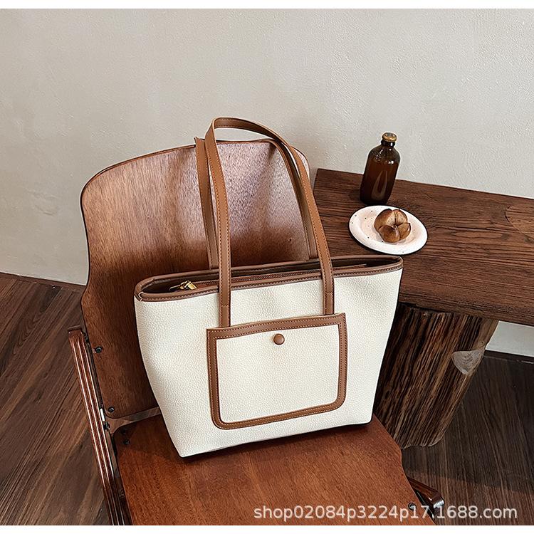 

2025 new women s simple retro soft leather commuting large capacity bag casual commuting shoulder tote bag