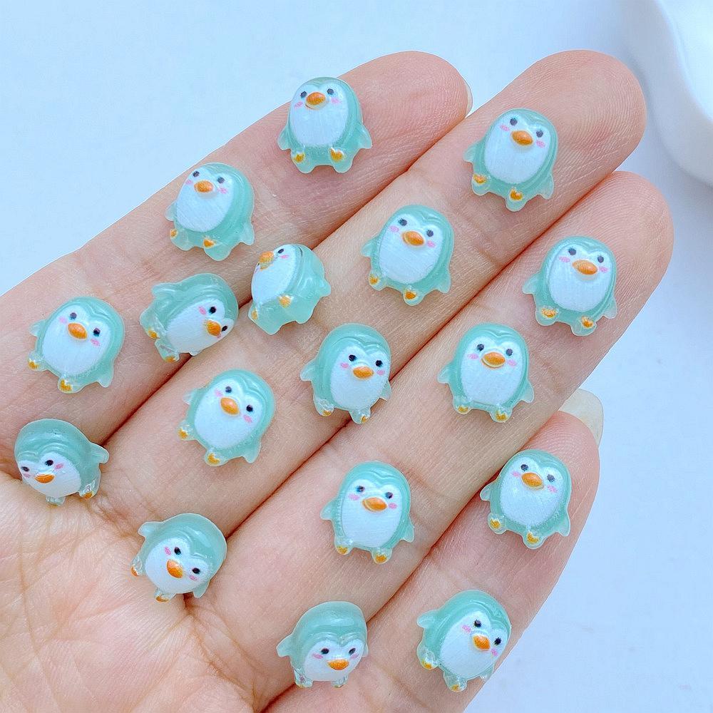 

50 шт. Новые милые мини-смолы 9 мм Серия мультяшных пингвинов Плоская задняя часть Детали для маникюра Украшения для аксессуаров для волос