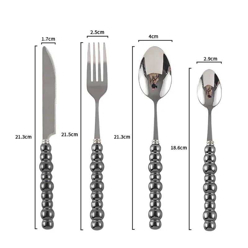 Zestaw 4-częściowy zestaw sztućców z ceramicznymi perłowymi uchwytami Nóż Widelec Łyżka Kreatywna urocza łyżka do zupy Sztućce do dań zachodnich Nóż do steków Zestaw łyżki i widelca
