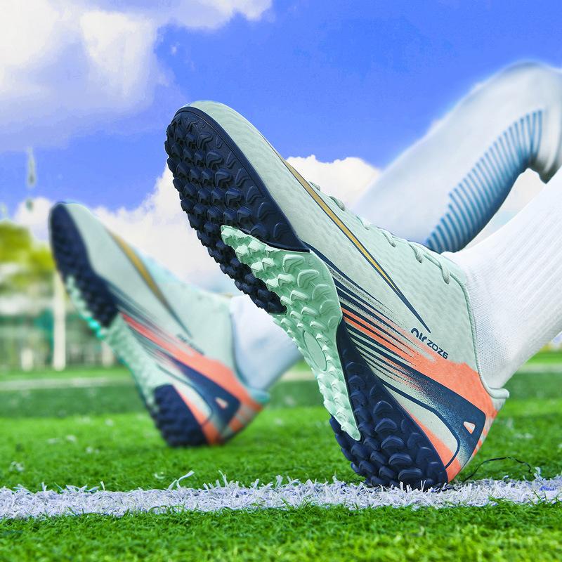 2025 New Breathable Football Shoes Male and Female Students Long Nails Youth Grass Flat Ground Broken Nails Training Shoes