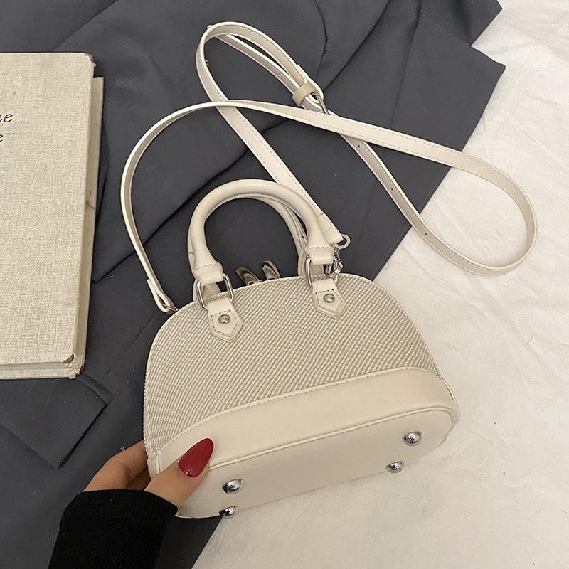 Korean Version of Niche Retro Style Contrasting Colors Splicing Portable Shell Bag Temperament Versatile Advanced Texture Commuter Messenger Bag Women