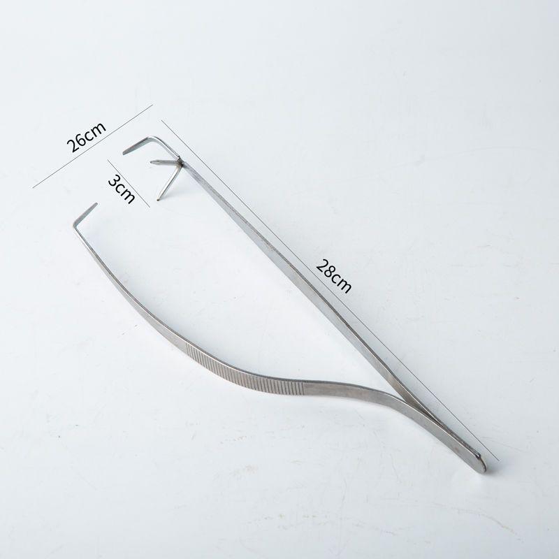 

Набор зажимов и плоскогубцев из нержавеющей стали для глазурования керамики ручной работы методом погружения.