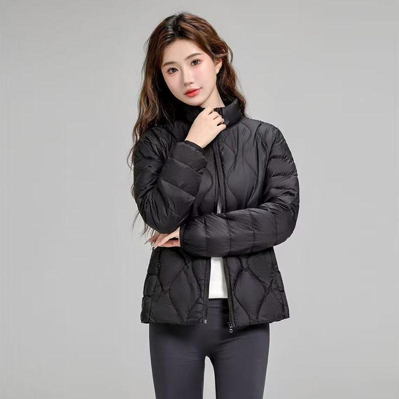 

Autumn and winter new stand-up collar light and thin women s down jacket white duck down light warm autumn and winter thin large size casual top XXXXL чорний