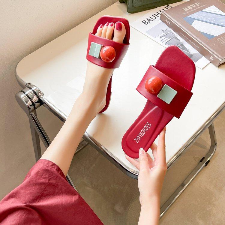 Lato 2025 damskie fajne kapcie noszenie styl zagraniczny noszenie nowa moda celebrytów internetowych płaskie jednosłowne świeże buty na miękkiej podeszwie