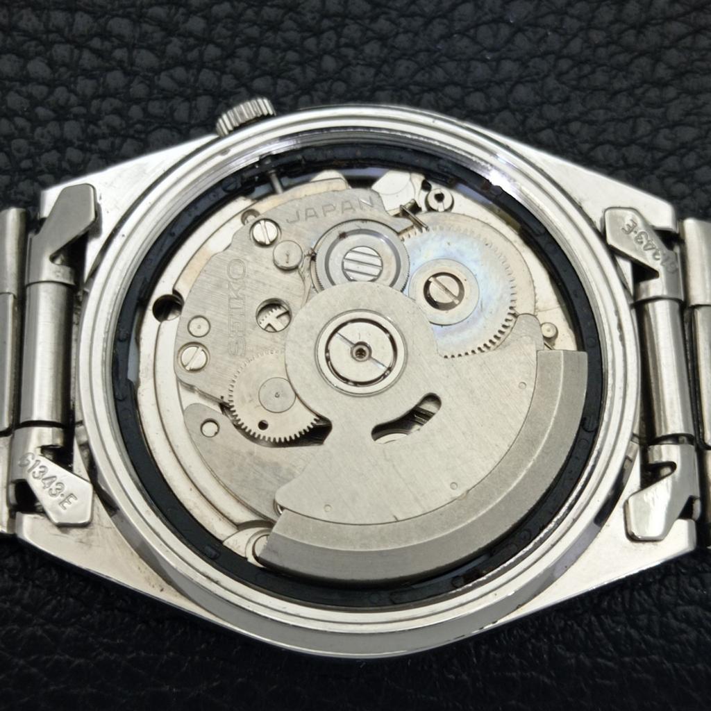 GENUINE VINTAGE SEIKO 5 AUTOMATIC 7009A JAPAN MENS BLACK DIAL WATCH A702405-5 R124-a702405