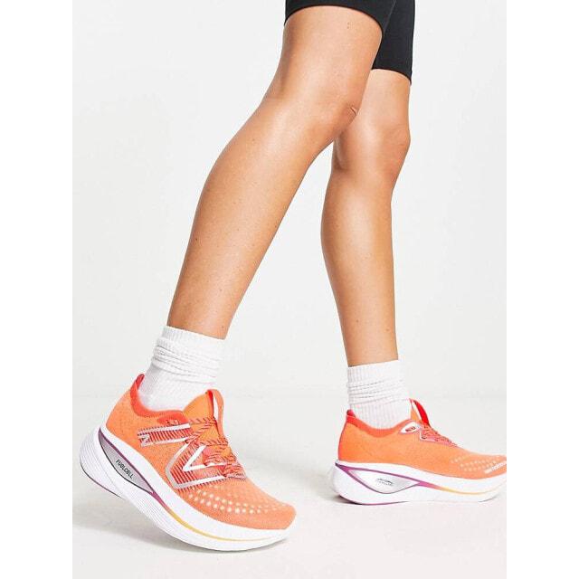 

New Balance Running Supercomp trainers in red