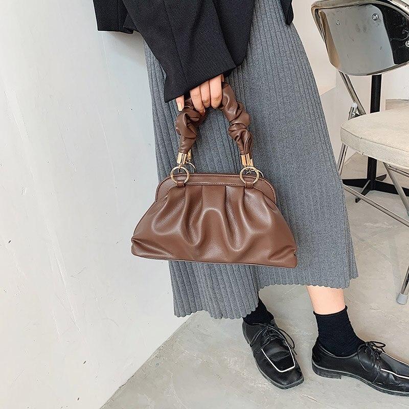 clutch handbolsa with handle