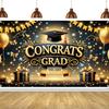 One item black and gold graduation gown congratulatory graduation decoration with balloons and gifts graduation party wall