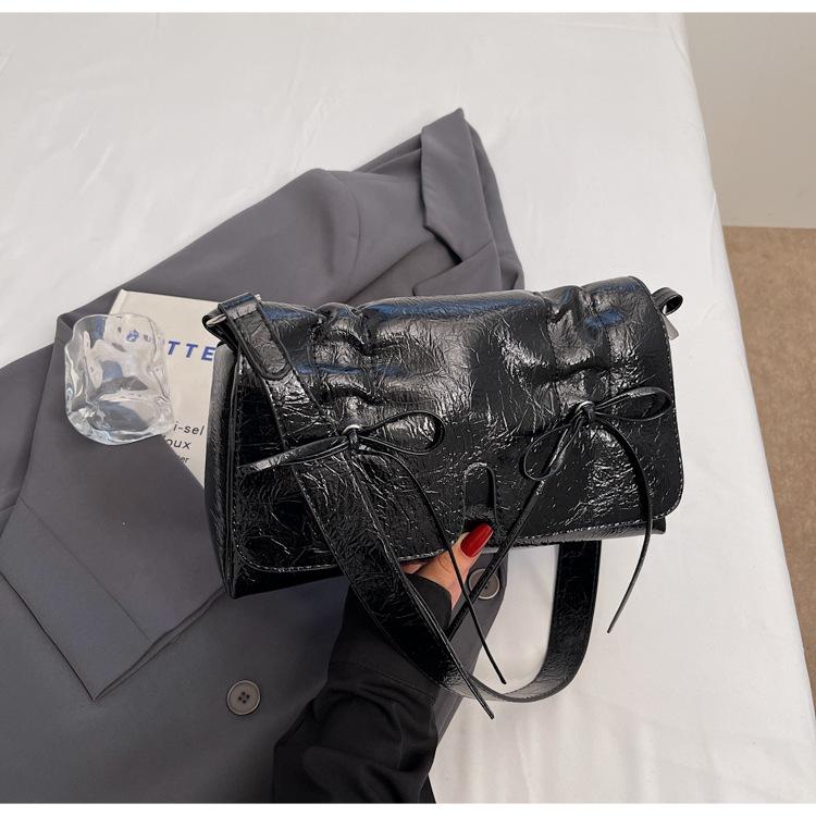 

Summer niche simple women s bag 2025 new girly bow small square bag versatile shoulder messenger bag