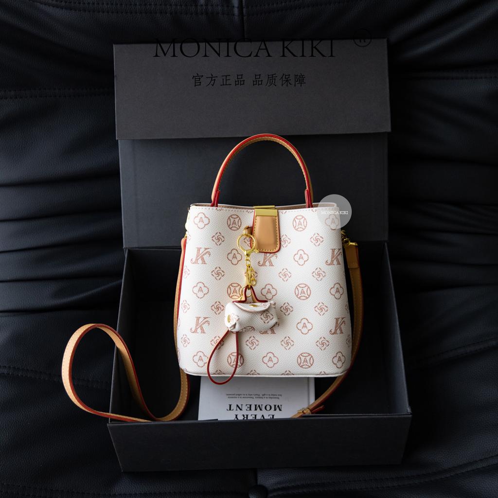 Light luxury niche bag women 2025 new super fire commuter old flower bucket bag foreign style versatile messenger bag