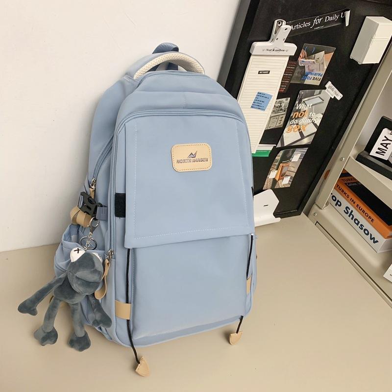 

New backpack female junior high school college student schoolbag solid color popular large capacity backpack simple fashion style single package