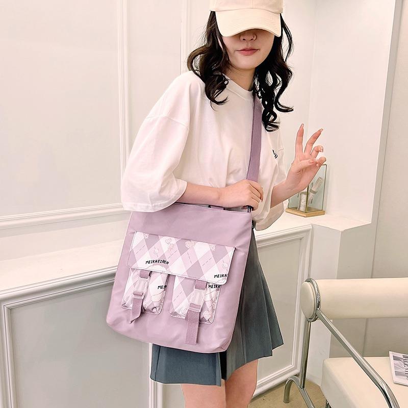Large-capacity student tutoring bag, new women's bag, fashionable contrasting color messenger bag, shoulder bag.