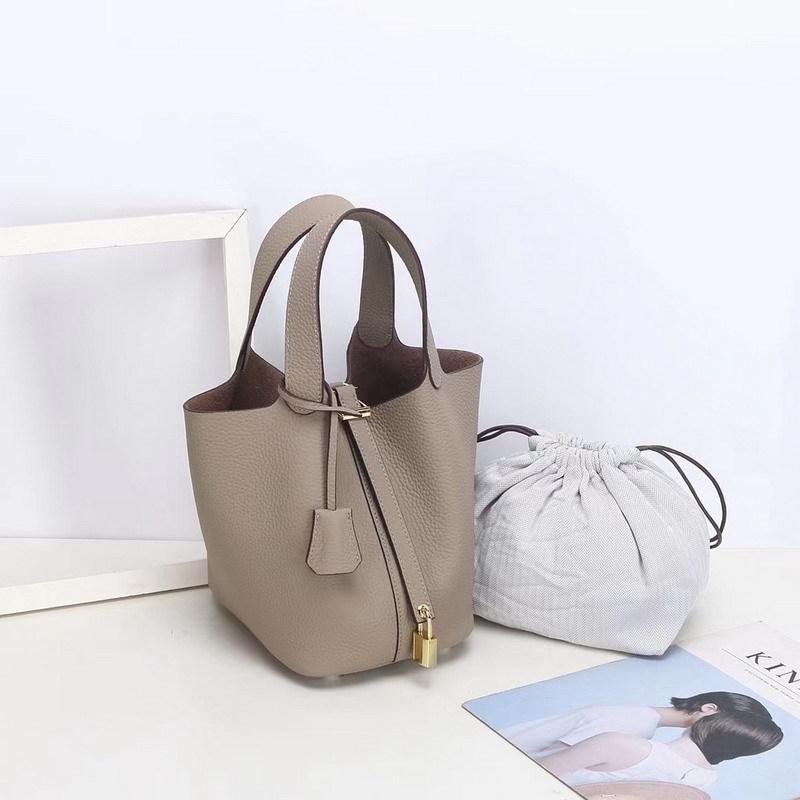 2026 new first-layer lychee pattern leather bucket bag European and American brand fashion gold buckle cowhide vegetable basket women's bag