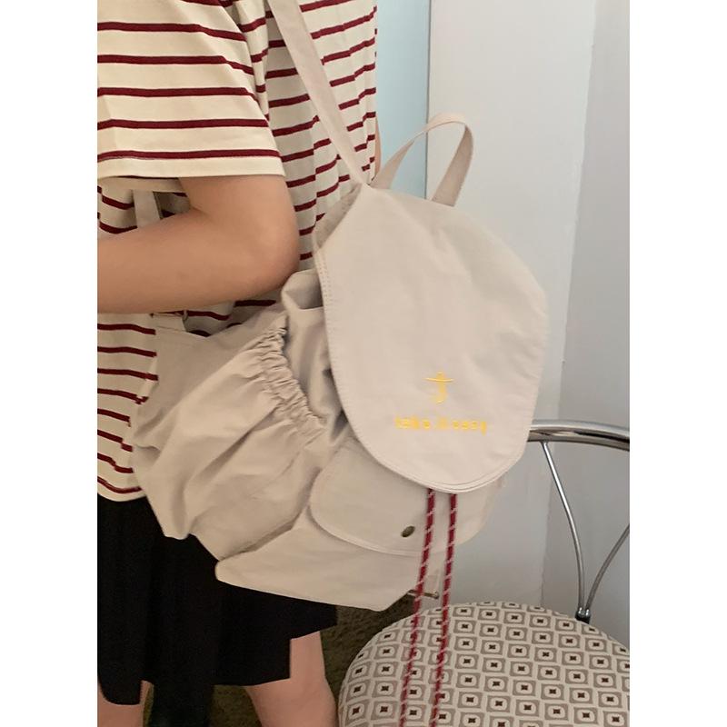 

Korean version of college style casual backpack women s 2025 new large-capacity canvas bag fashion travel backpack бежевый