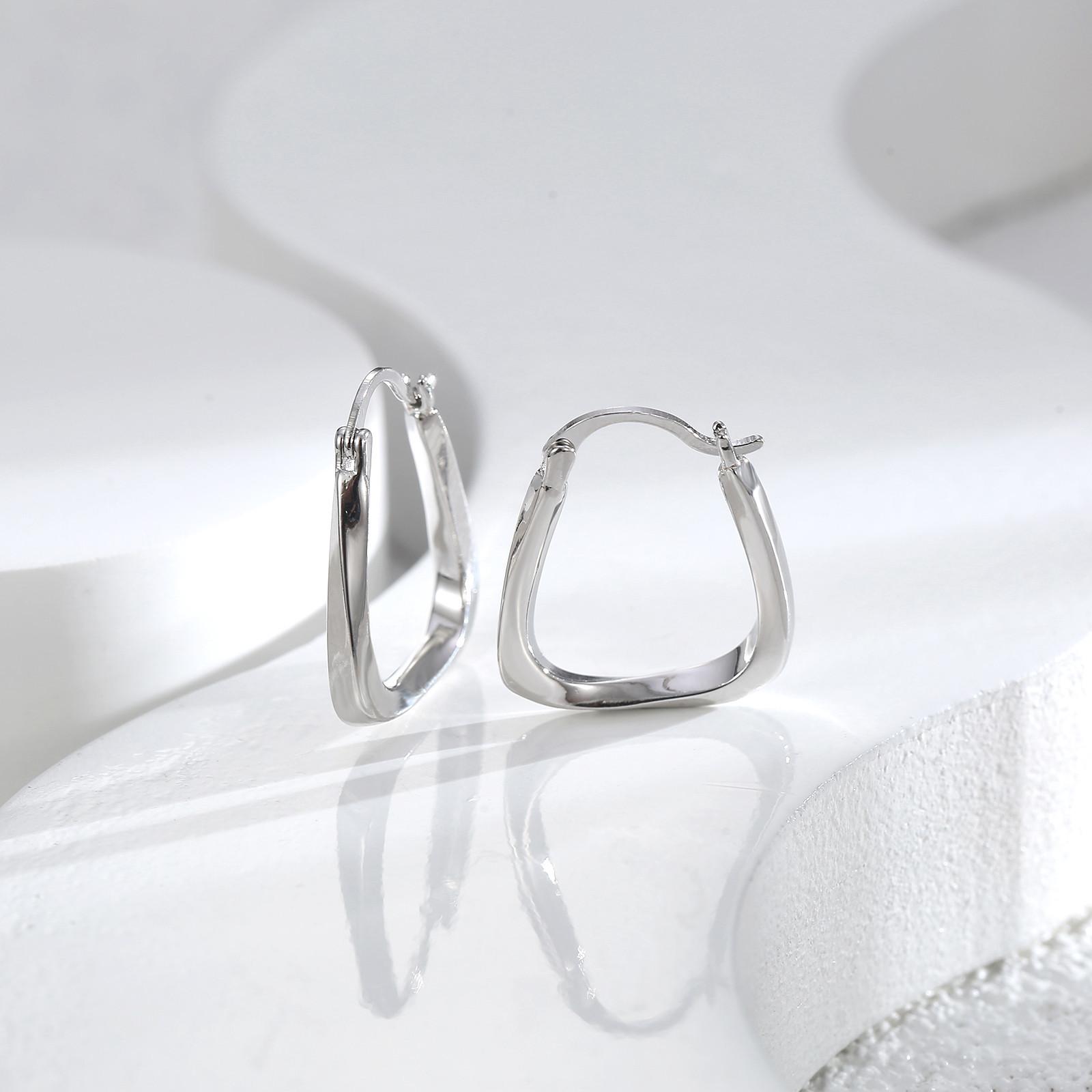 

Simple square geometric hollow metal earrings 2025 new women s fashion niche design ear buckle earrings