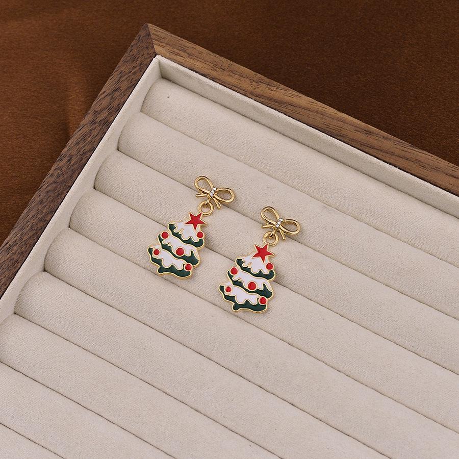 

Japanese & Korean Christmas Bow Earrings - Cute Candy Cane, Snowflake, and Tree Designs
