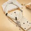 Personality diamond-set imitation pearl cross double-layer sweater chain temperament necklace