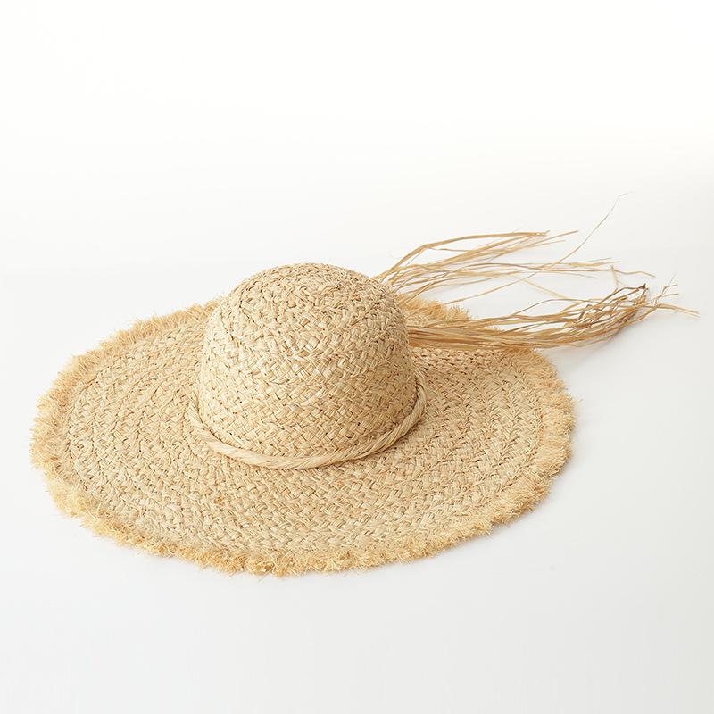 Spring and summer new versatile casual hand-woven straw hat fashionable raffia rough edge beach vacation sun protection simple sun hat