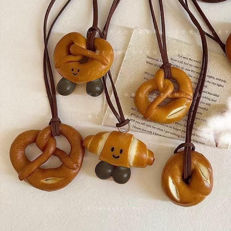 Handmade alkaline water bread pendant neck necklace croissant kink bagel bag decorative pendant deerskin rope sweater chain