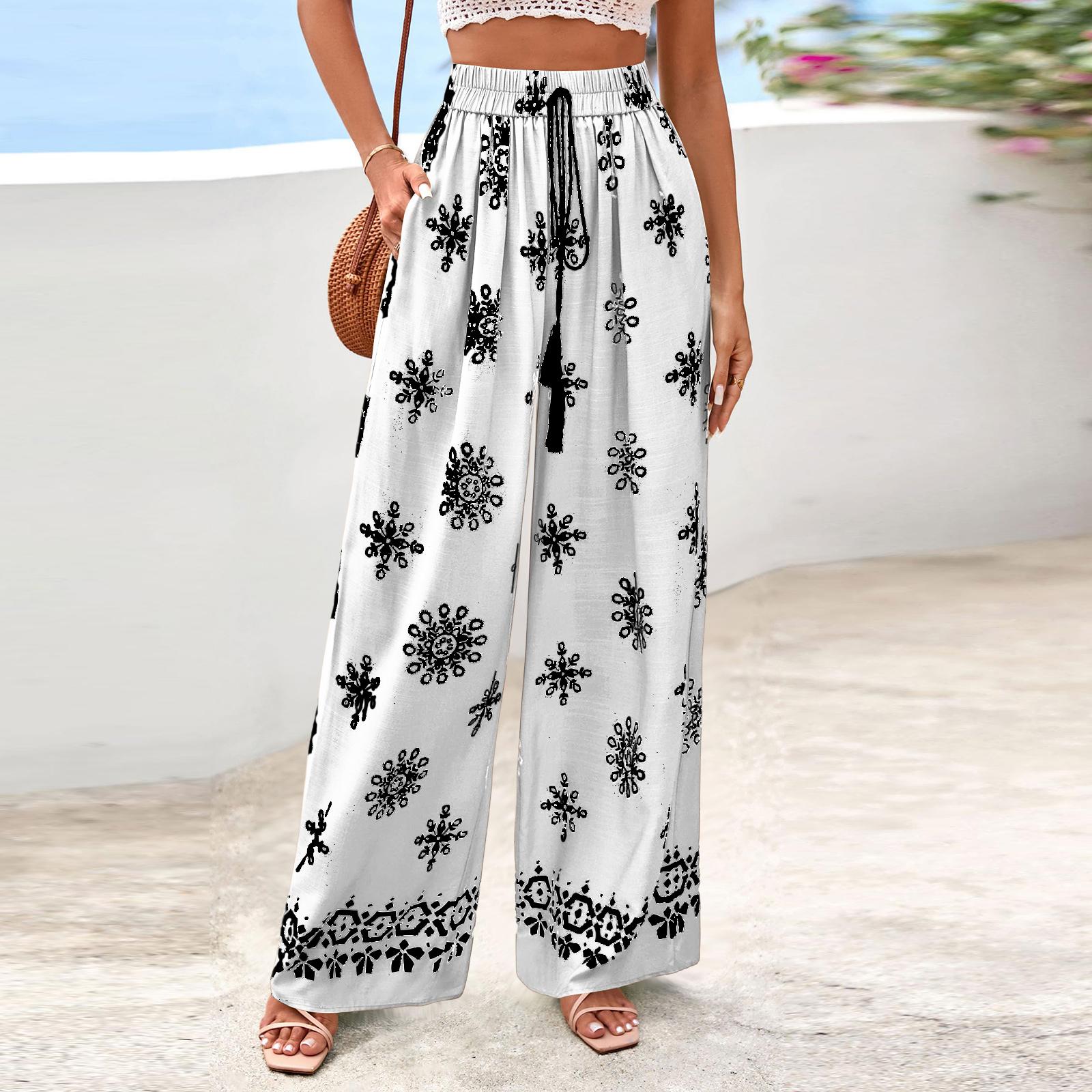 Женские широкие повседневные струящиеся брюки в цветочек L белый