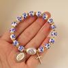 Chinese Style Blue and White Porcelain Bracelet Elastic Vintage Beaded Bow Bracelet Versatile Pretty Ceramic Bracelet for Women