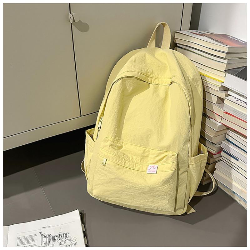 The new schoolbag is high-value, fresh and sweet, candy-colored backpack, lightweight and large-capacity backpack for junior high school students.