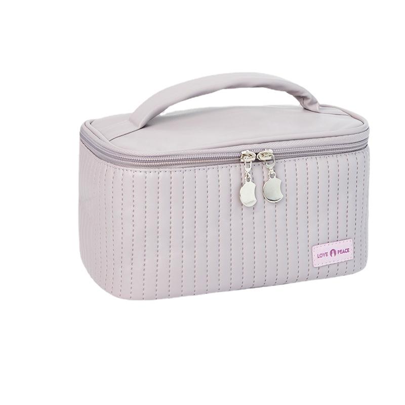 Advanced Sense Cream Cake Cosmetic Bags for Female Hand Carrying Travel Makeup Storage Bag Portable PU Wash Toiletries Bag