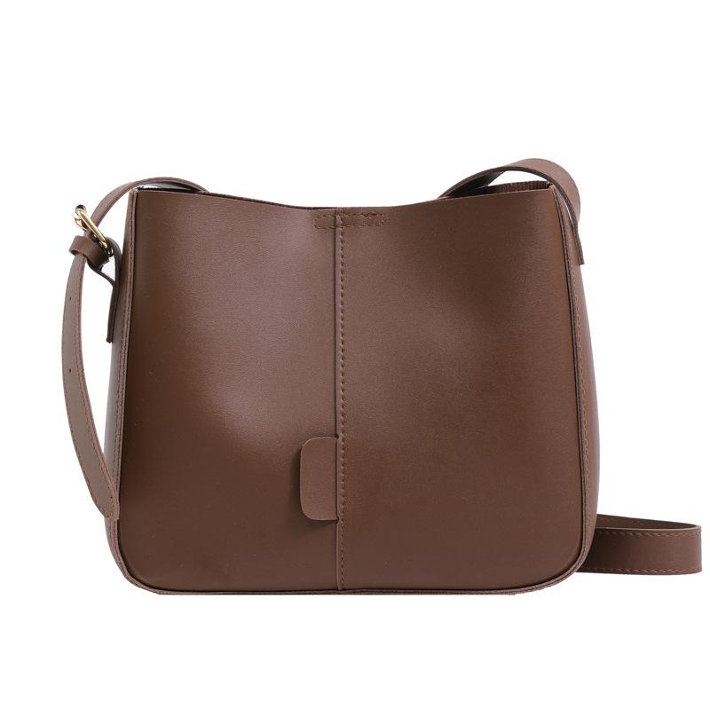 New autumn and winter fashion and leisure 2025 retro solid color large capacity texture shoulder crossbody bucket women's bag