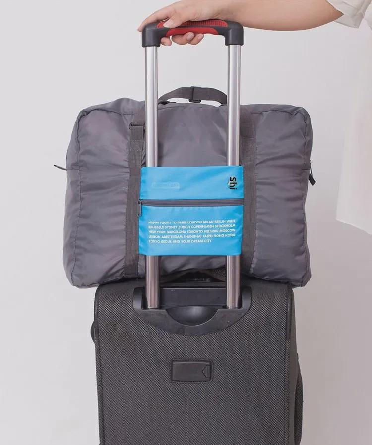 Skládací cestovní taška na kolečkách s velkou kapacitou 32 l - přenosná, ruční a kompatibilní s leteckou dopravou pro cesty na krátké vzdálenosti