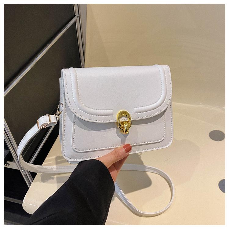 

Французская персонализированная сумка для поездок на работу, простая текстура, женская, 2024, новая модная сумка-мессенджер, сумка через плечо с замком в иностранном стиле белый