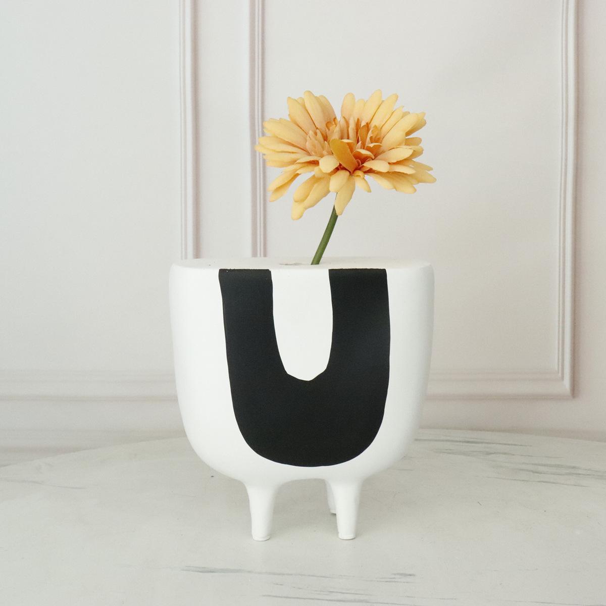 

Nordic Black & White Resin Geometric Figure Sculpture with Irregular Flower Holder