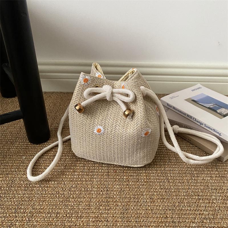 2026 Sommer Damen Strohgewebte Eimer Tasche: Kordelzug im koreanischen Stil für Urlaub, Strand oder Pendeln