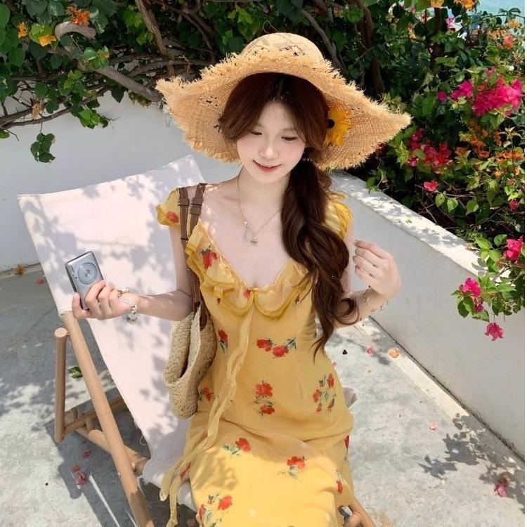 Seaside vacation style temperament waist beautiful long dress women's summer new French coffee break yellow floral dress