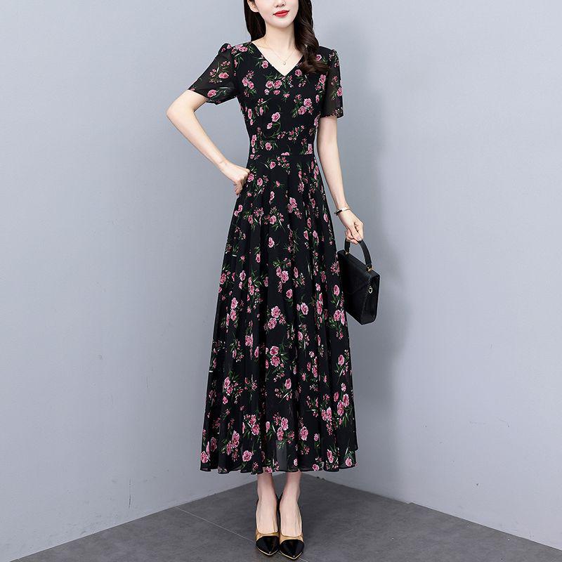 Elegant Summer Floral Print Dress: Knee-Length, Loose Fit, Slimming Waist, Short-Sleeved, Large Hem.