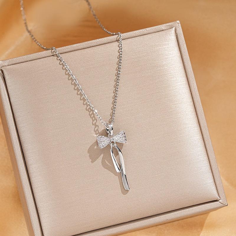 French Light Luxury Tassel Bowknot Necklace - Stylish Women's Clavicle Chain with Personality Design