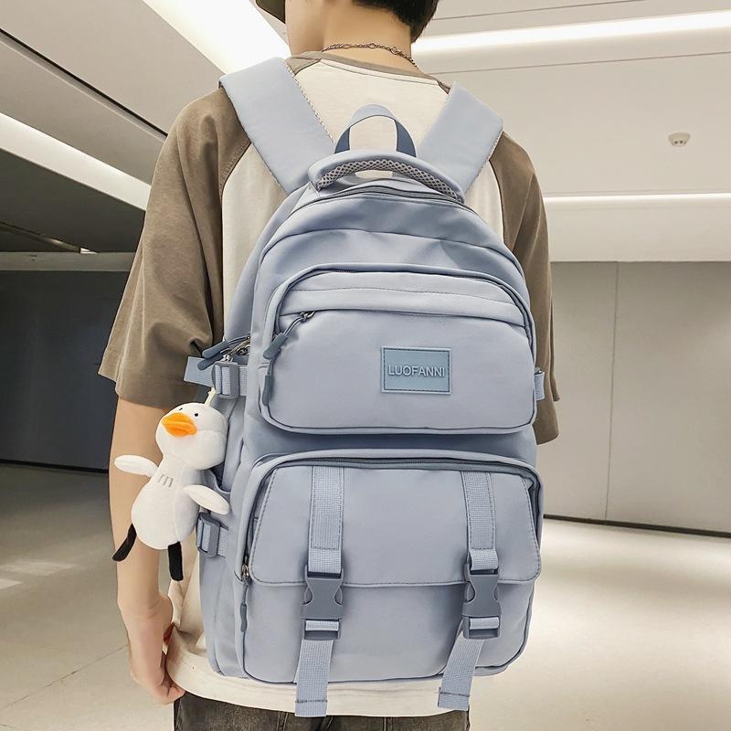 Solid color multi-pocket schoolbag female Korean version high school college student backpack light color couple large capacity ins backpack