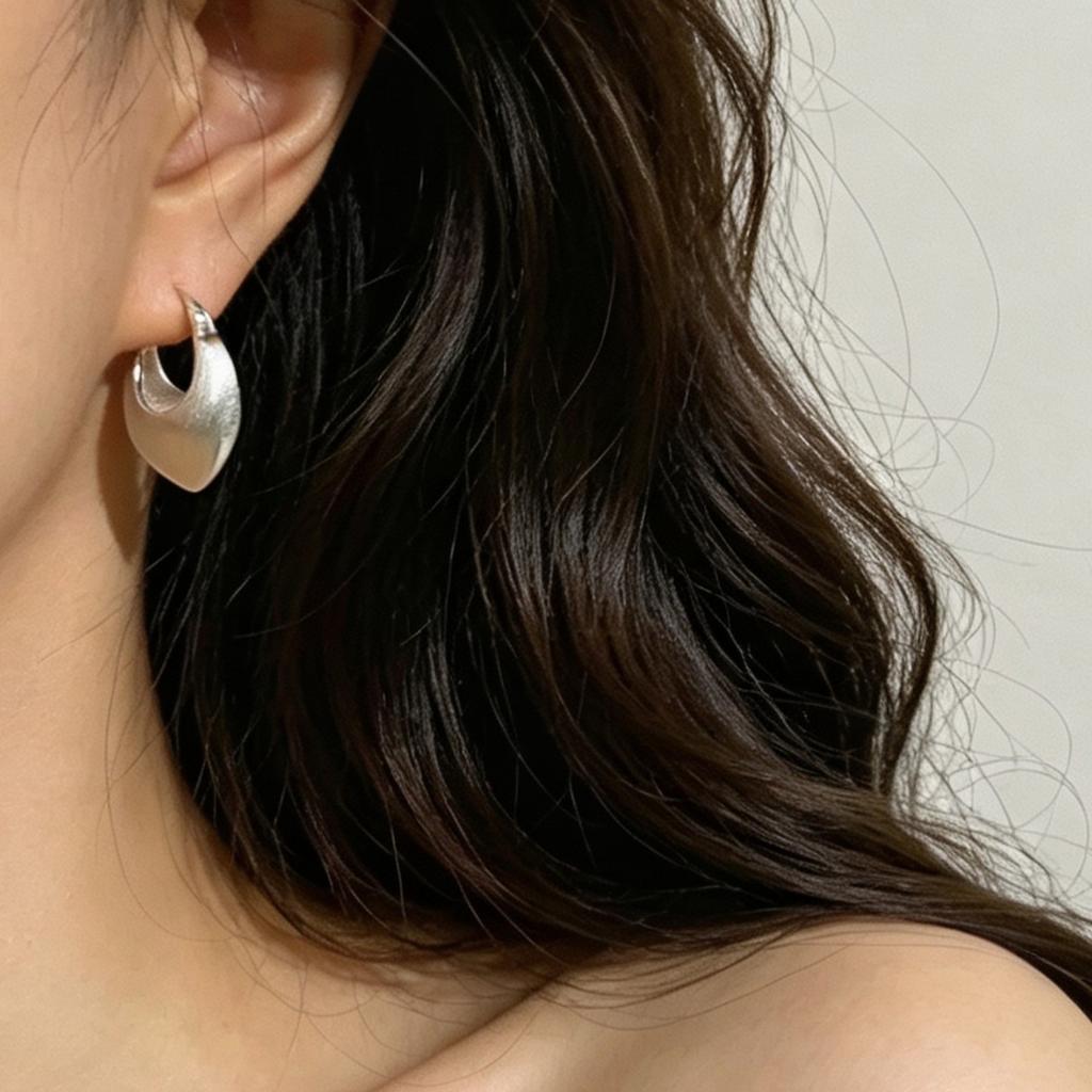 1011 new Korean version irregular lock bag matte brushed earrings women's new light luxury niche fashion earrings
