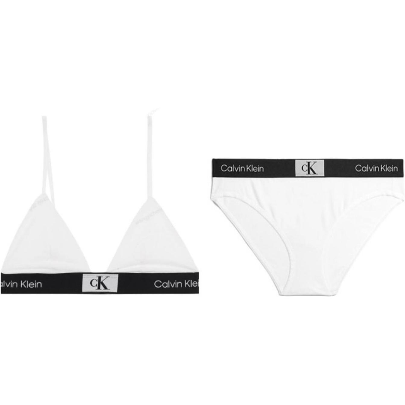 

Calvin Klein Комплект женского белья: удобный треугольный бюстгальтер с жаккардовым узором в виде букв и трусики миди с высокой посадкой. Белый QF7217-110+QF7222-110 XS