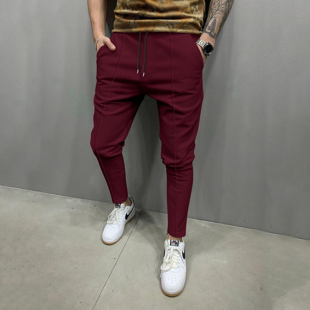 Four Seasons Men's New Solid Color Tethered Trousers Loose Casual Sports Elastic Waist Straight Pants