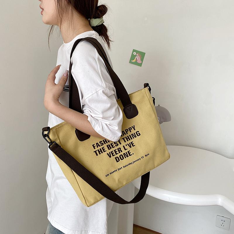2025 new trendy simple portable canvas bag large capacity leisure shoulder bag college student shopping bag tote bag
