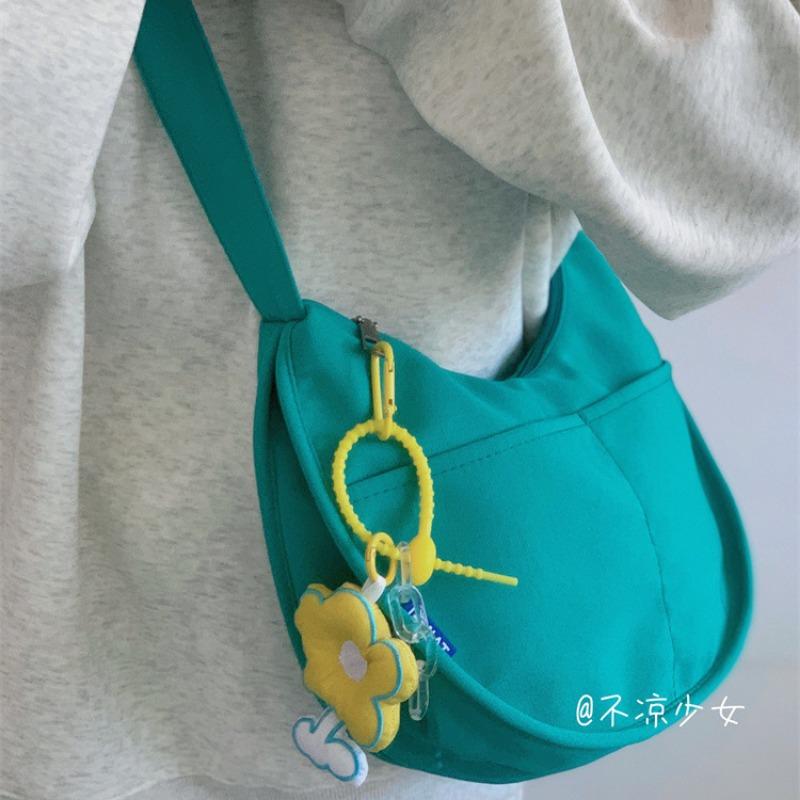 

Simple casual women s bag commuter messenger bag small fresh literary girl canvas bag shoulder bag dumpling bag no pendant синий