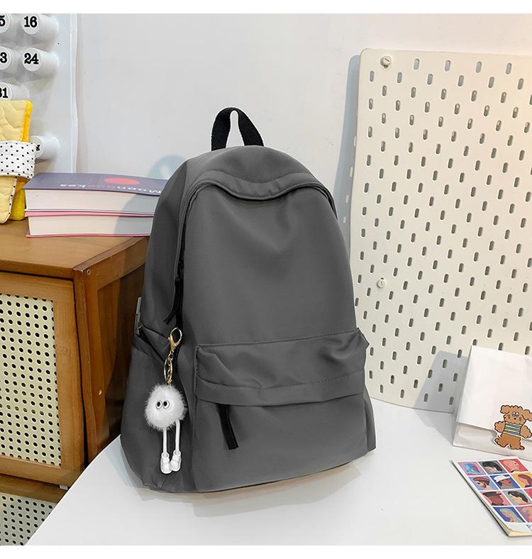 School bag new fashion solid color large capacity school bag Korean version ins versatile simple backpack casual spring outing light backpack